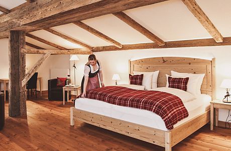 The Wilder Kaiser JR suite is spacious, with an attic ambience, wood beams and cosy Alpine style - a relaxing time-out awaits you here.